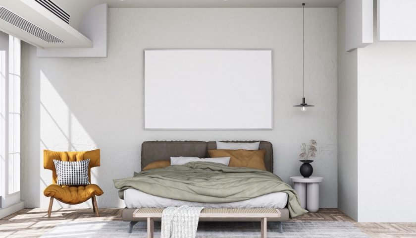 un lit dans une chambre avec un cadre de lit